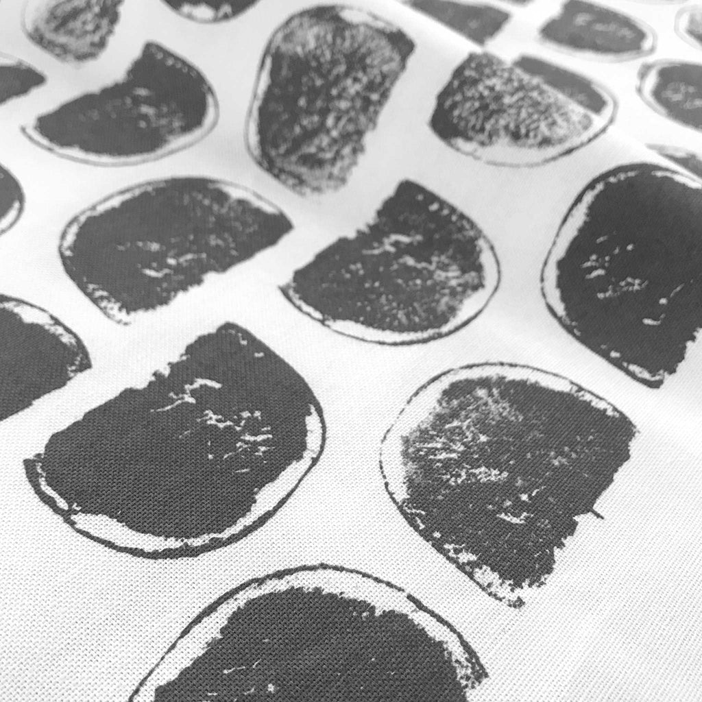 Detail of Betsy Marie's veggie printed tea towel with a graphic pattern made from printing sweet potatoes